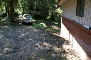 Prior to the retaining wall, May 2009 A muddy area where the first wall went